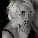 L.